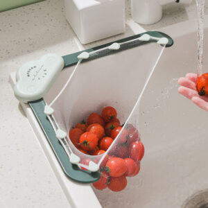 Triangular silicone kitchen sink mesh drain rack in use