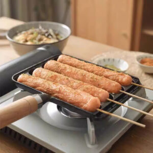 Cast iron sausage pan for grilling